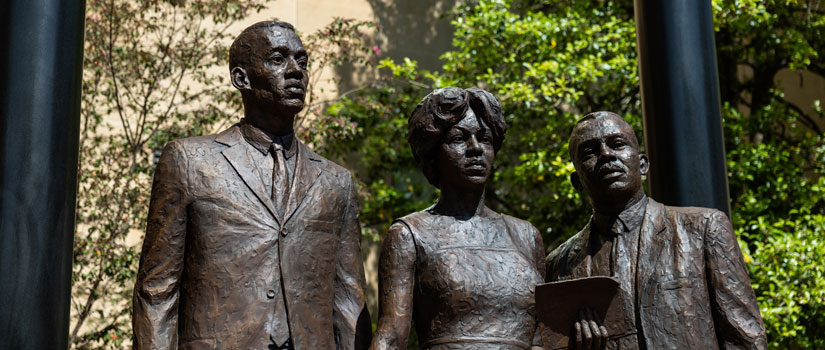 Bronze statue commemorating first three African American students admitted to USC since Reconstruction.