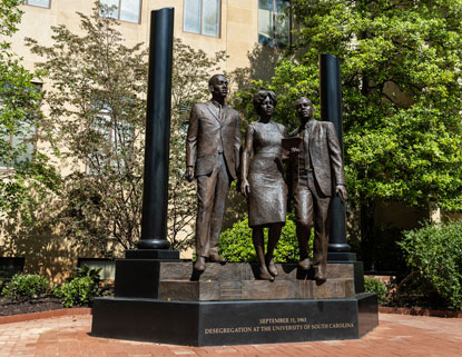 Bronze statue commemorating first three African American students admitted to USC since Reconstruction.