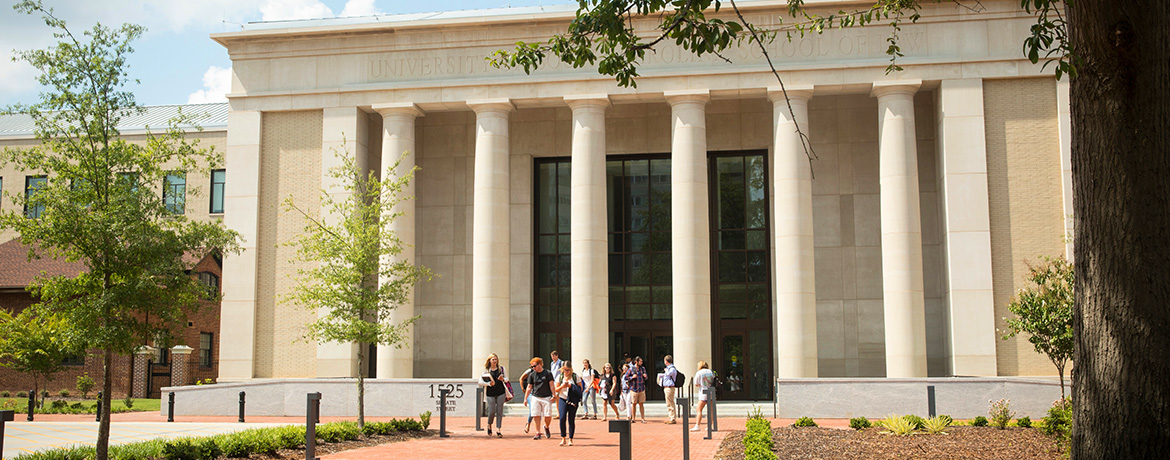 students in front of the School of Law building